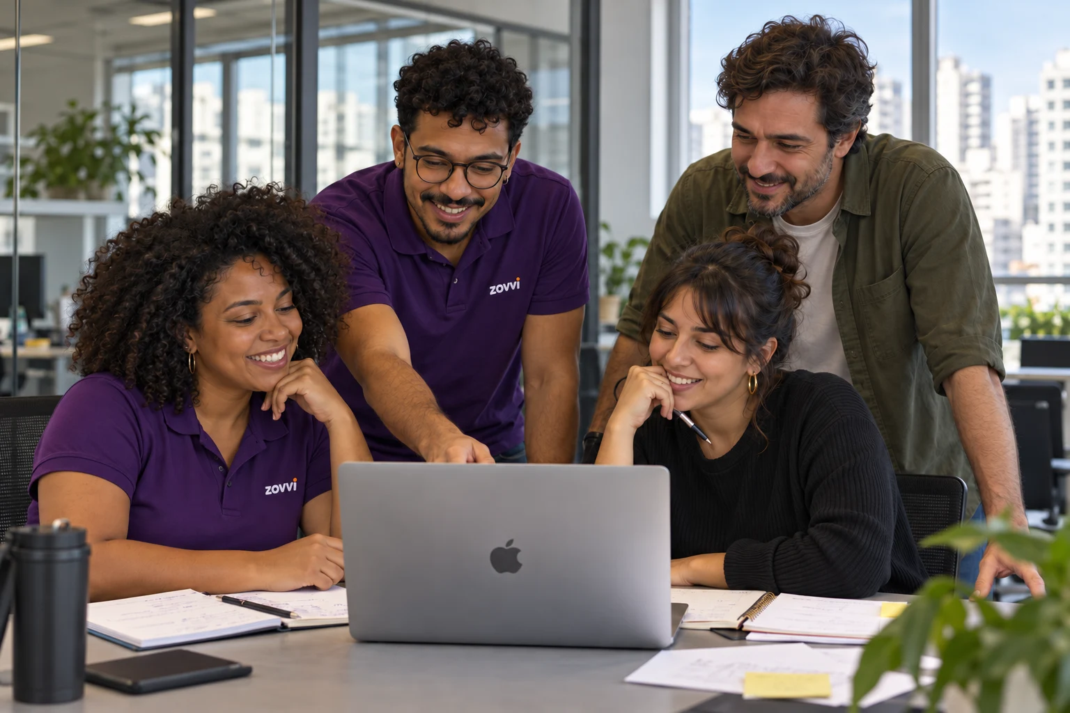 Professionals collaborating on a project in a contemporary office