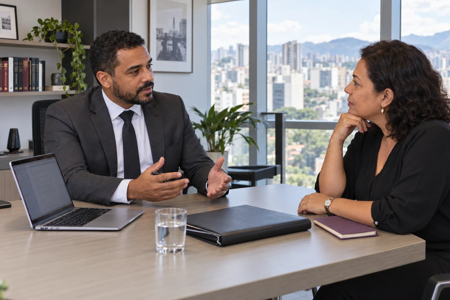Lawyer speaking with a client in an office in Brazil